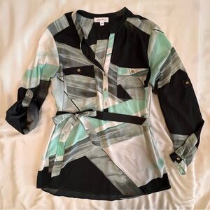 Calvin Klein Women’s Size Medium Blouse with matching belt.